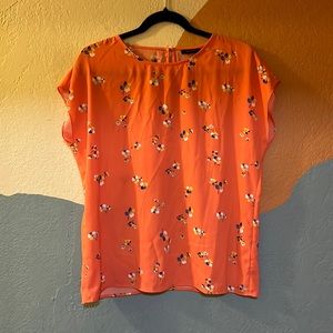 Coral top with flowers
